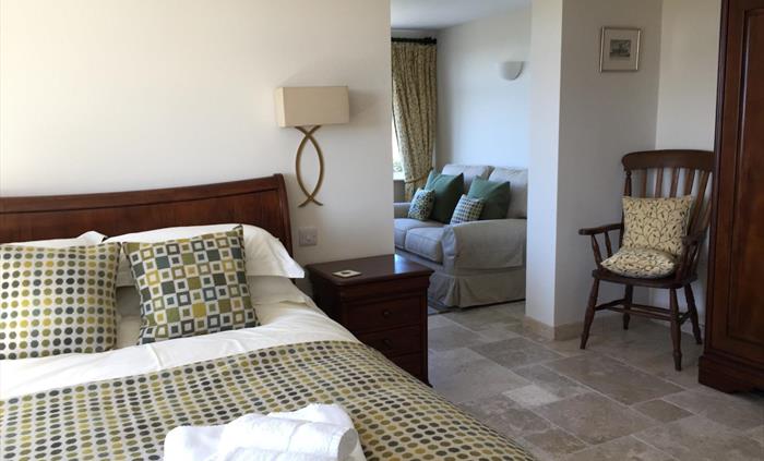 Comfortable Ramsey king suite, with sea views of  Whitesands bay and the offshore islands.